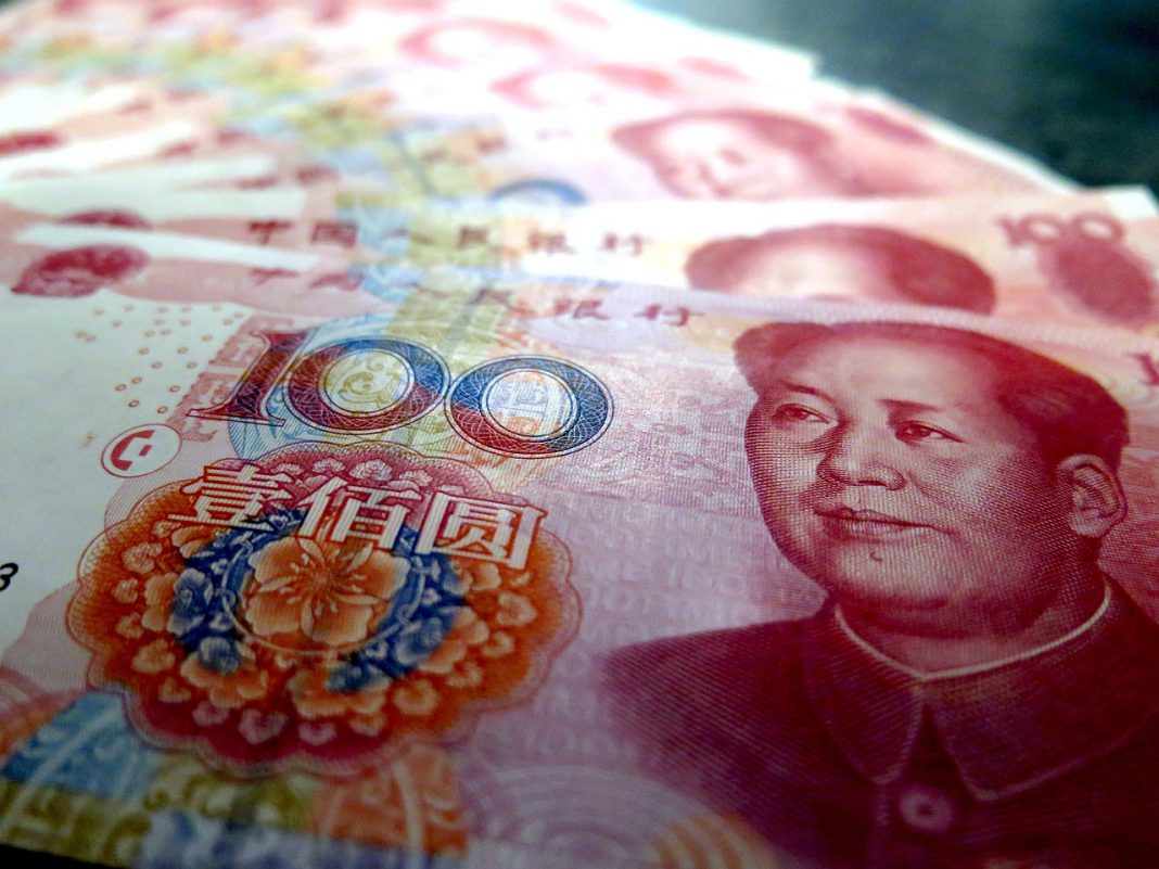 China: yuan breaks key level as trade war escalates