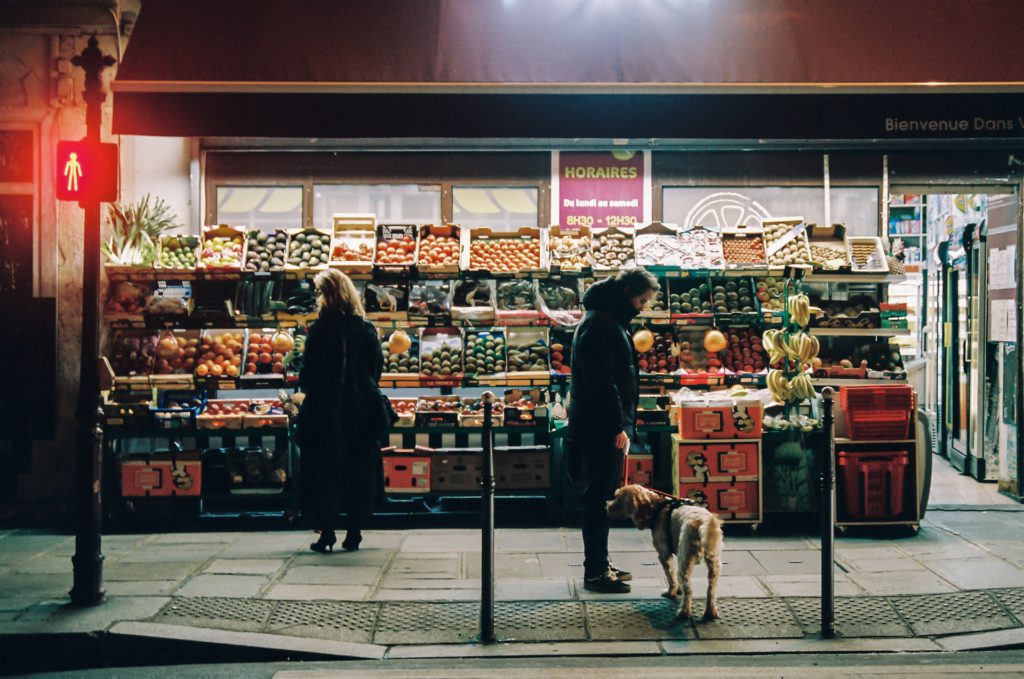 Young people shopping at a market in Europe