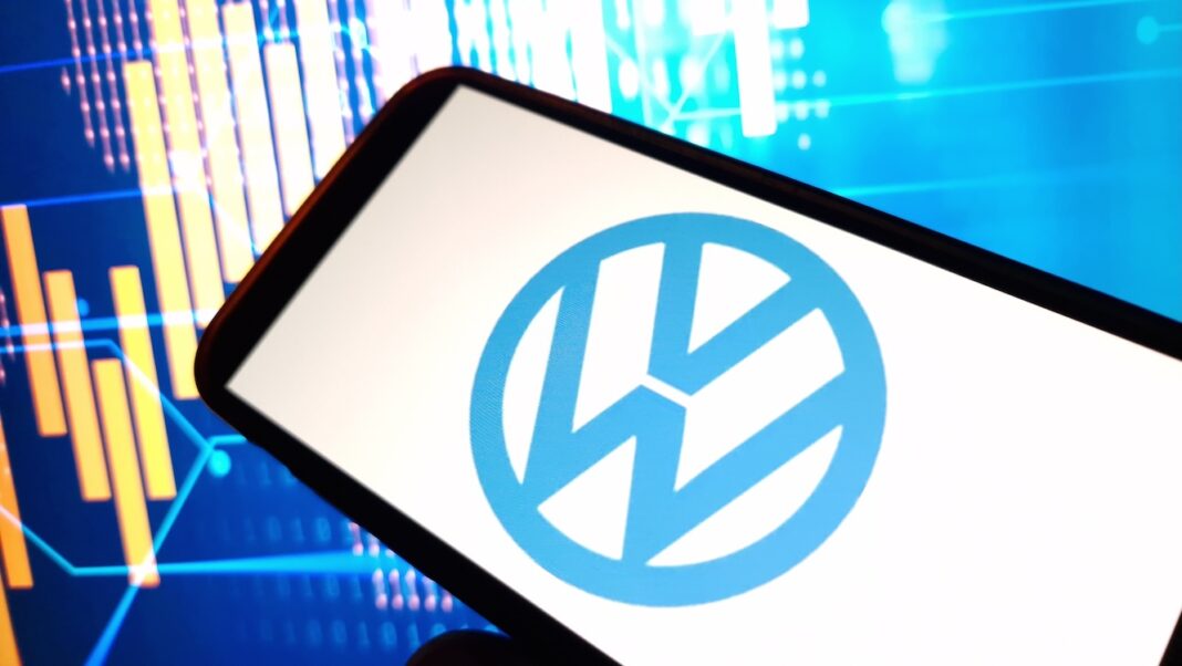 Smartphone screen displaying the WordPress logo in a blue circle with colorful digital charts in the background as a data-themed scene.