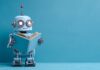 AFP: ¡Los desarrolladores están probando formas de comunicarse con libros usando IA! Robot with book. Source: Adobe Stock